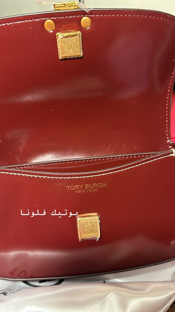 شنطة يد عنابي
