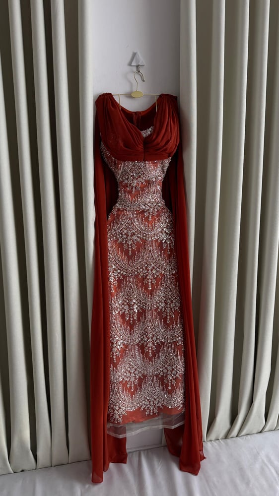 Evening dress with embroidered mask