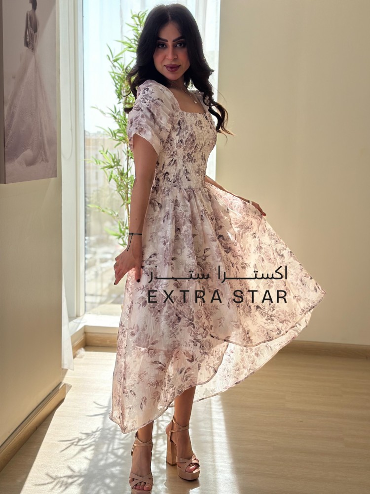 A floral dress with a distinctive cut