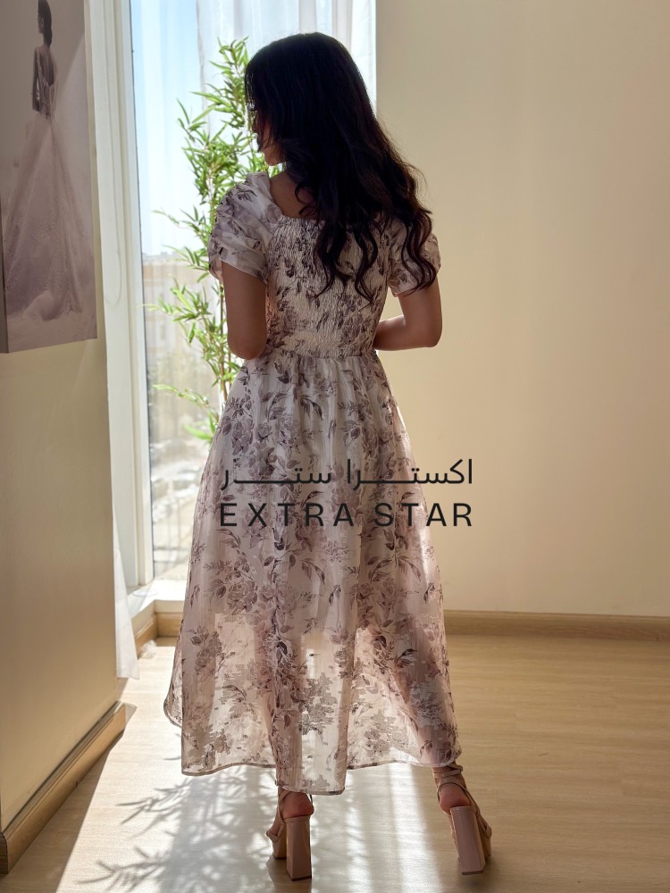 A floral dress with a distinctive cut