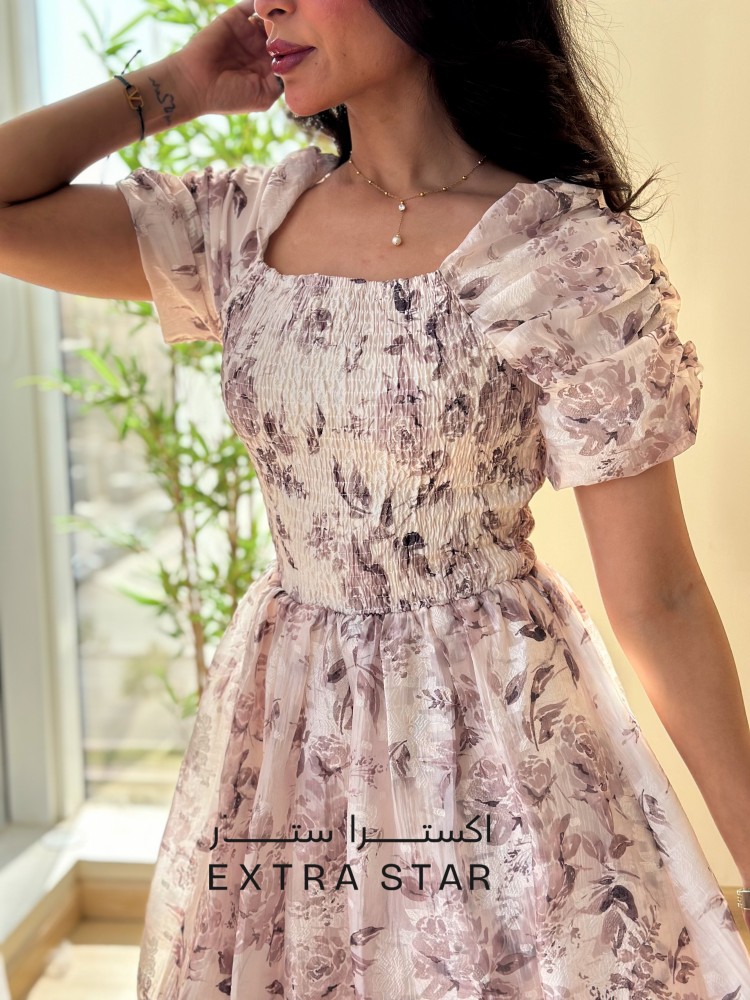A floral dress with a distinctive cut