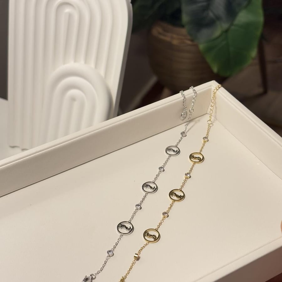 YSL bracelet silver and gold