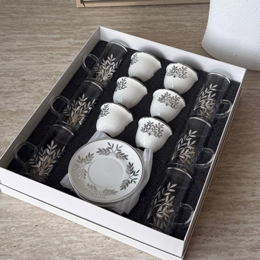 A set of coffee cups and glasses