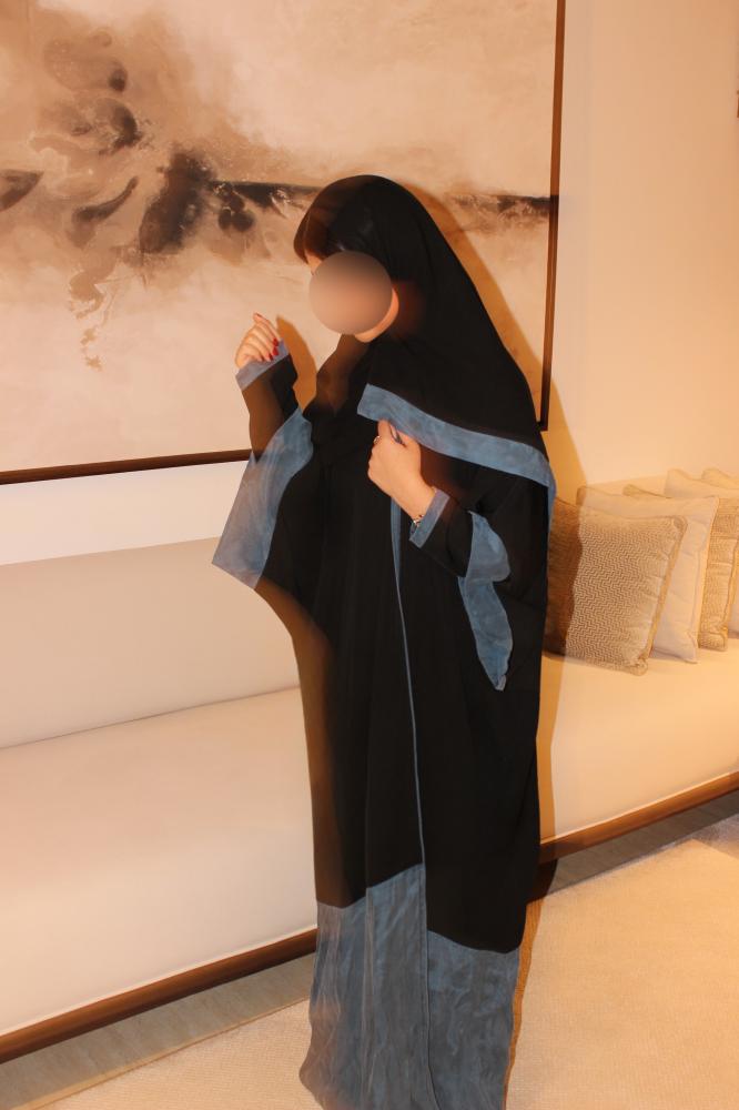 Double-sleeve abaya combining black Korean crepe with dusty blue washed Turkish silk.