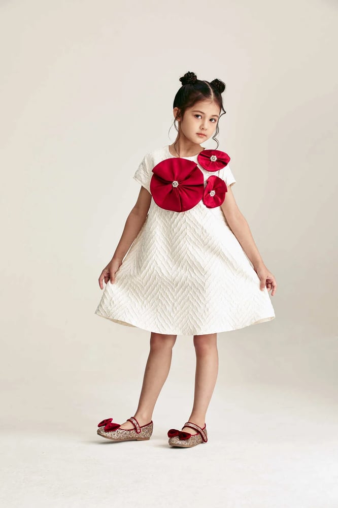 Dress decorated with prominent flowers