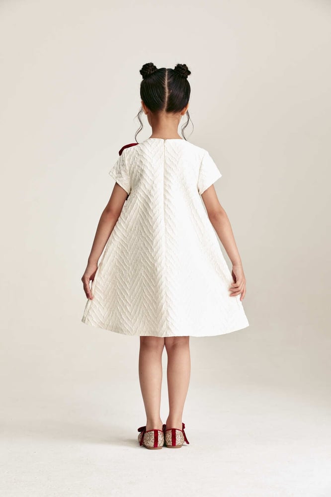 Dress decorated with prominent flowers