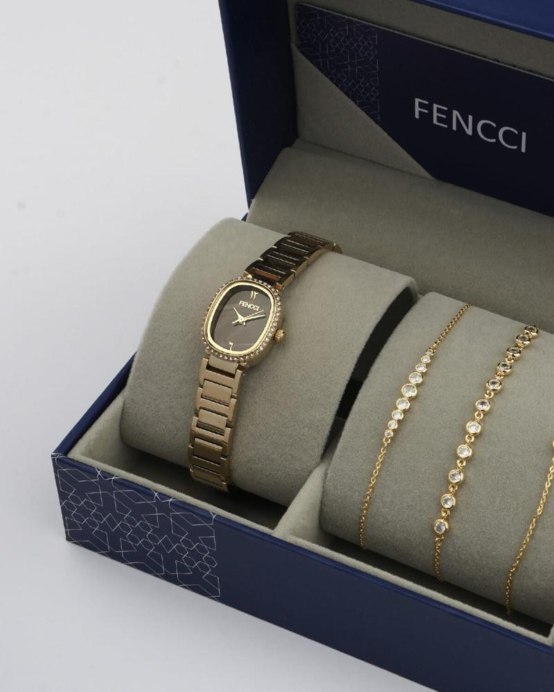 A women's gift: a Versace watch and bracelets in gold color