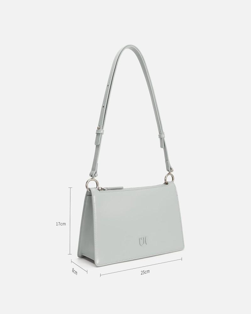 Women's bag made of leather in light blue color