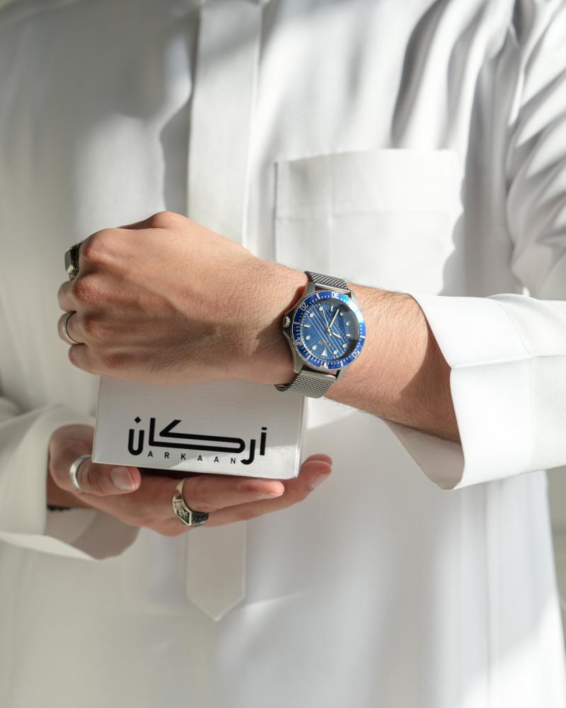 ‎  ساعة رجالية زايروس بسير شبكي رمادي