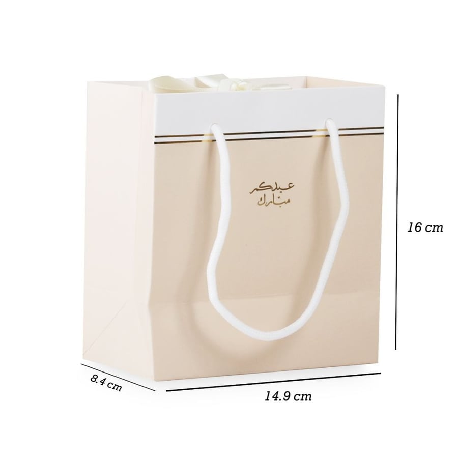 Luxurious Eid bags in beige and white color with the stamp "Eid Mubarak