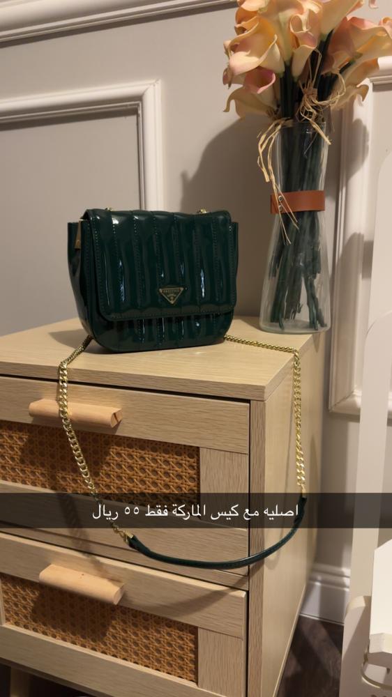 شنطة اصلية اخضر  فخمة مخفضة