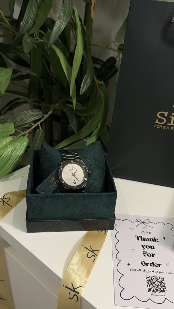Silver watch with two swords and palm tree SK