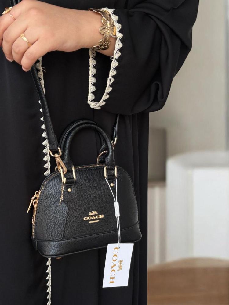 Mini Coach bags with the brand box