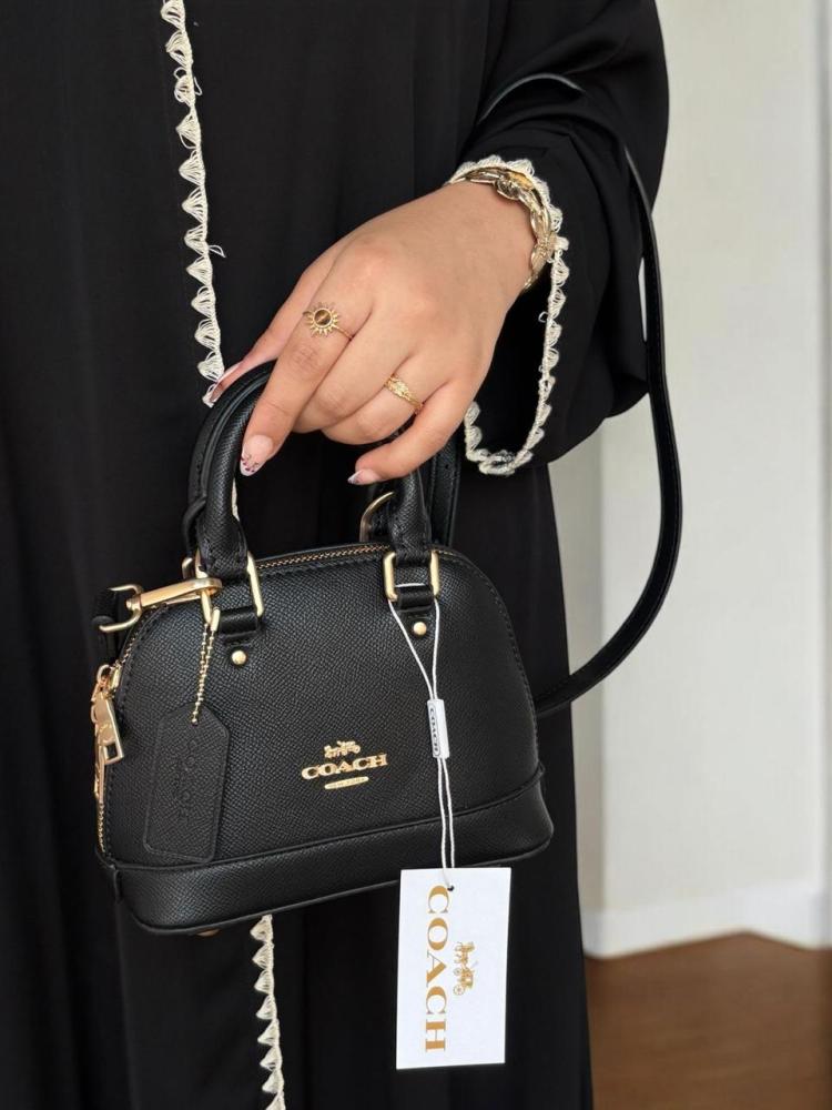 Mini Coach bags with the brand box