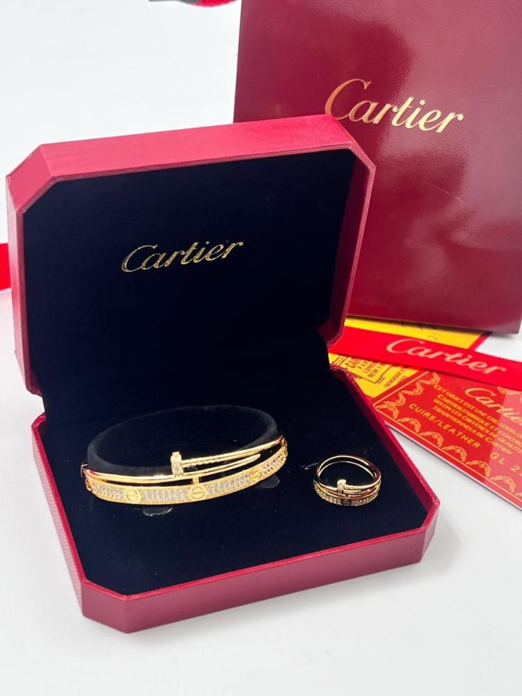 Cartier set, bracelet with ring, gold and silver