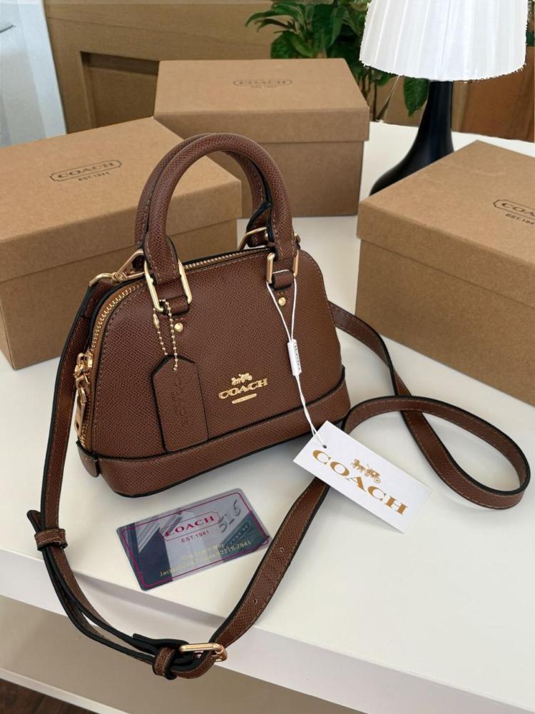 Mini Coach bags with the brand box