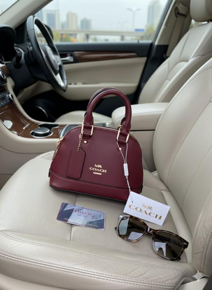 Mini Coach bags with the brand box