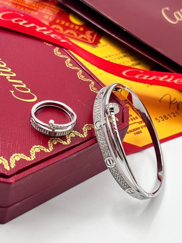 Cartier set, bracelet with ring, gold and silver
