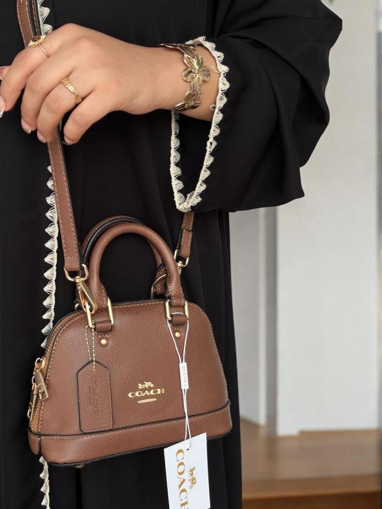 Mini Coach bags with the brand box