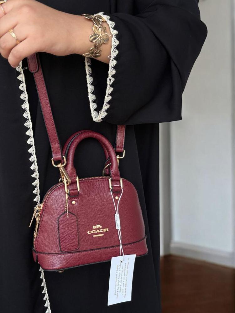 Mini Coach bags with the brand box