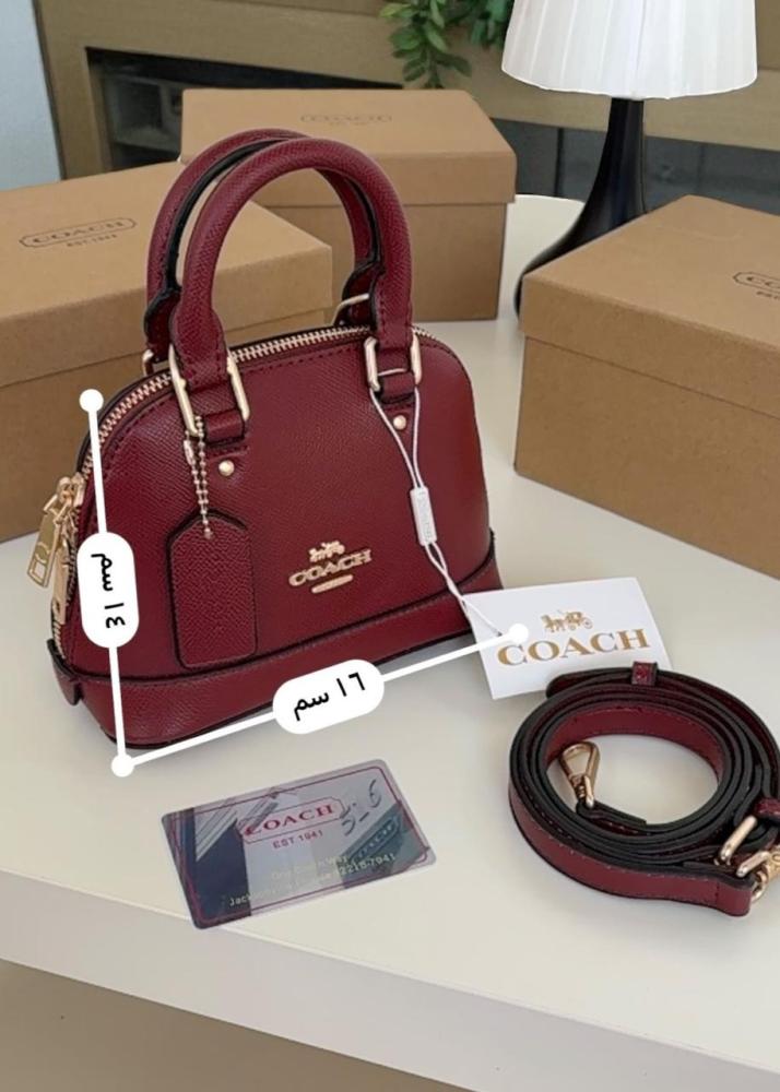 Mini Coach bags with the brand box