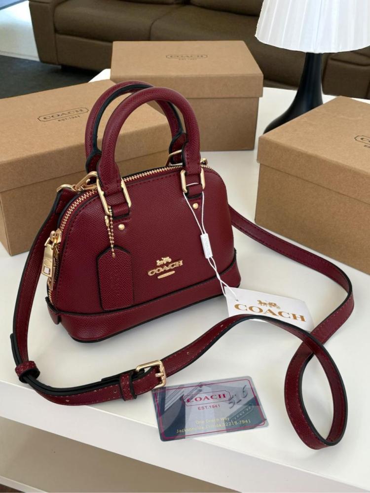 Mini Coach bags with the brand box
