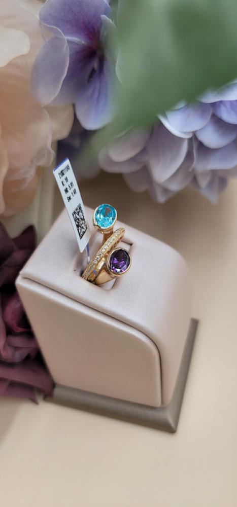 Gold ring with two turquoise and purple stones, 18 karat