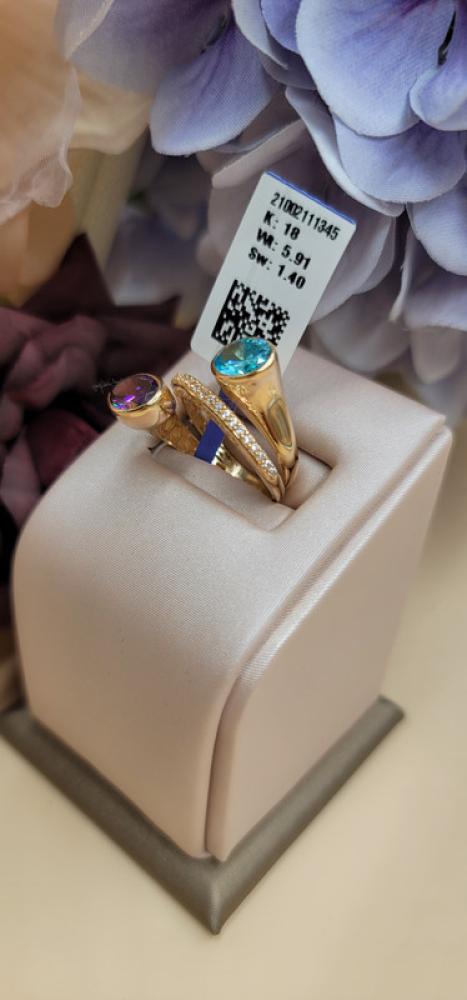 Gold ring with two turquoise and purple stones, 18 karat