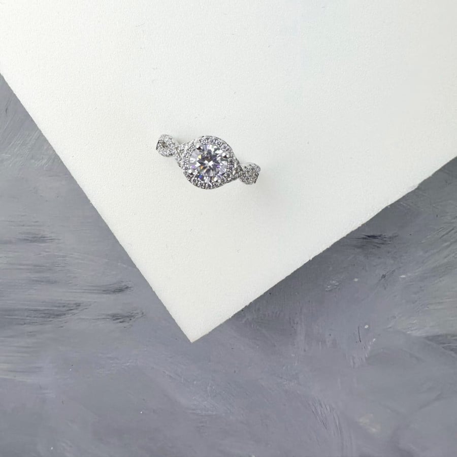 Silver ring set with zircon
