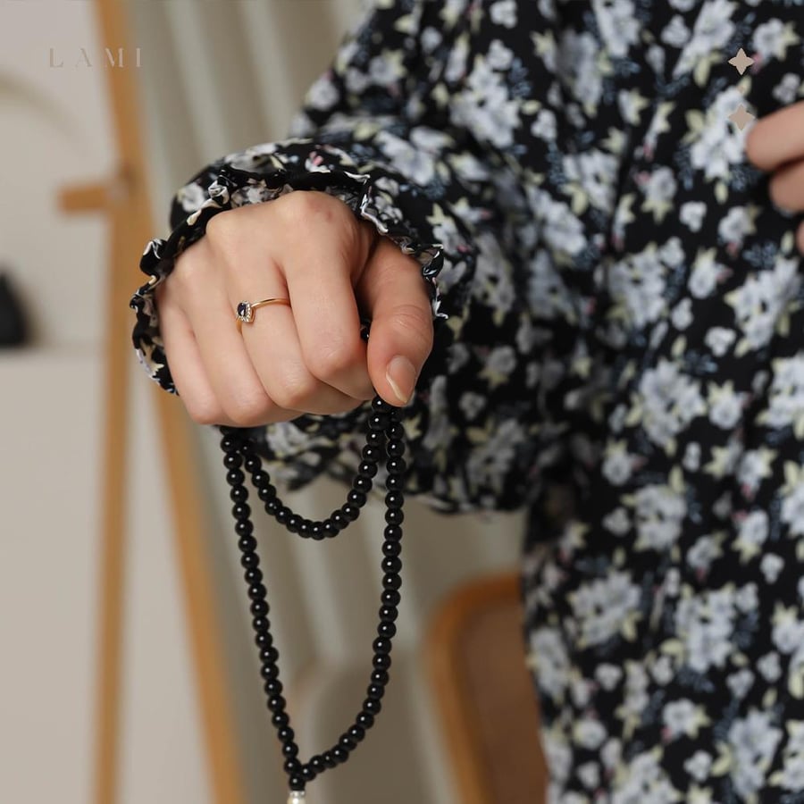 Black floral prayer sheet