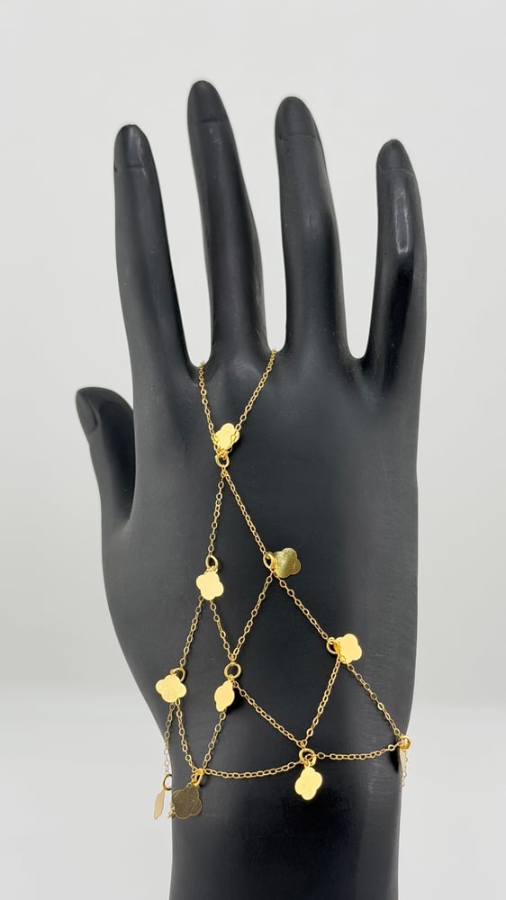 Gold hand with rose design 21 karat