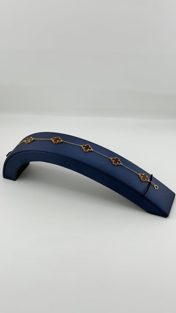 Gold bracelet with rose design, 18 karat