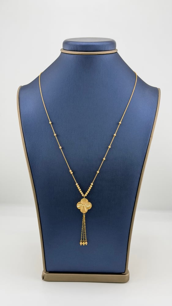 Gold necklace with rose design