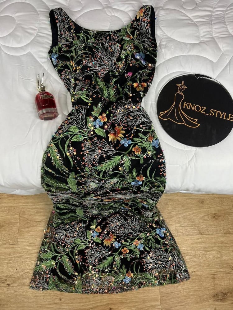 A floral dress, original cost
