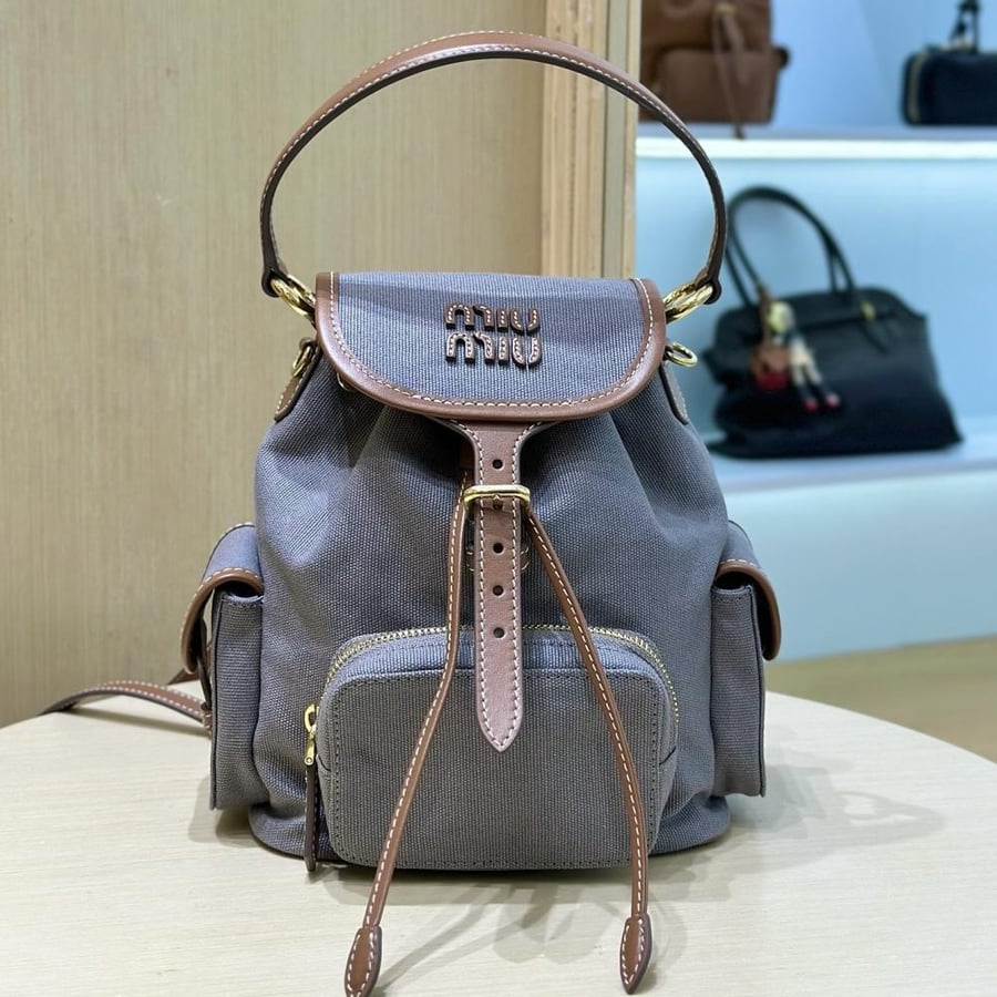 شنطة ميو ميو Small Canvas Backpack Miumiu مقاس 22 cm