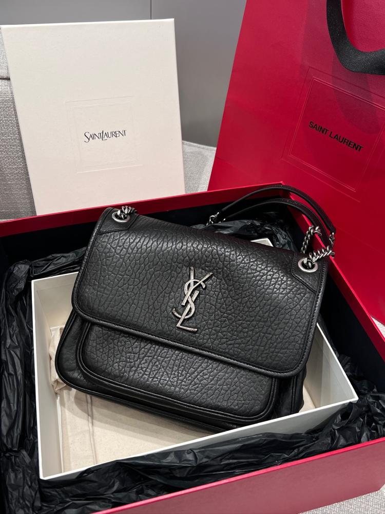 سان لوران Niki Saint Laurent