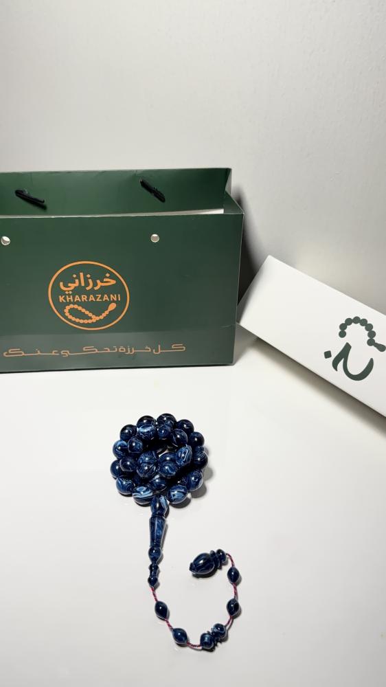 بكلايت ازرق مموج خراطة يدوية ، حجم الخرز : ١٣ ملي في ١٠  ، القصه: بيض حمام ، عدد الخرز: ٤١