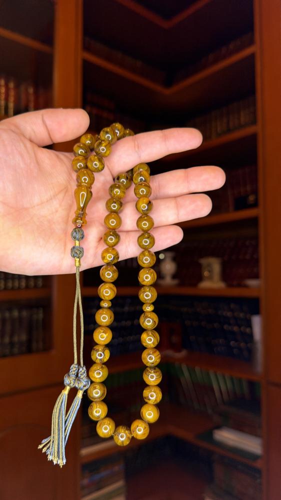 سندلس زيتوني مموج بكركوشة ، عدد الخرز: ٤٥ ، حجم الخرز: ١١ ملي