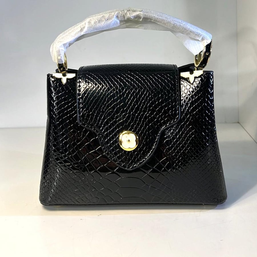 حقيبة - louis vuitton