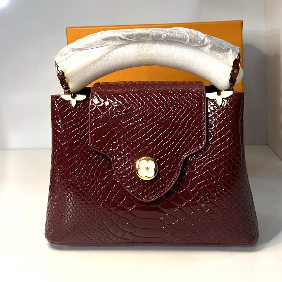 حقيبة - louis vuitton