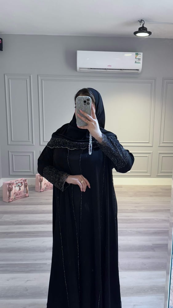 عباية سهم قماش ملكي نص كلوش بتل وترتر