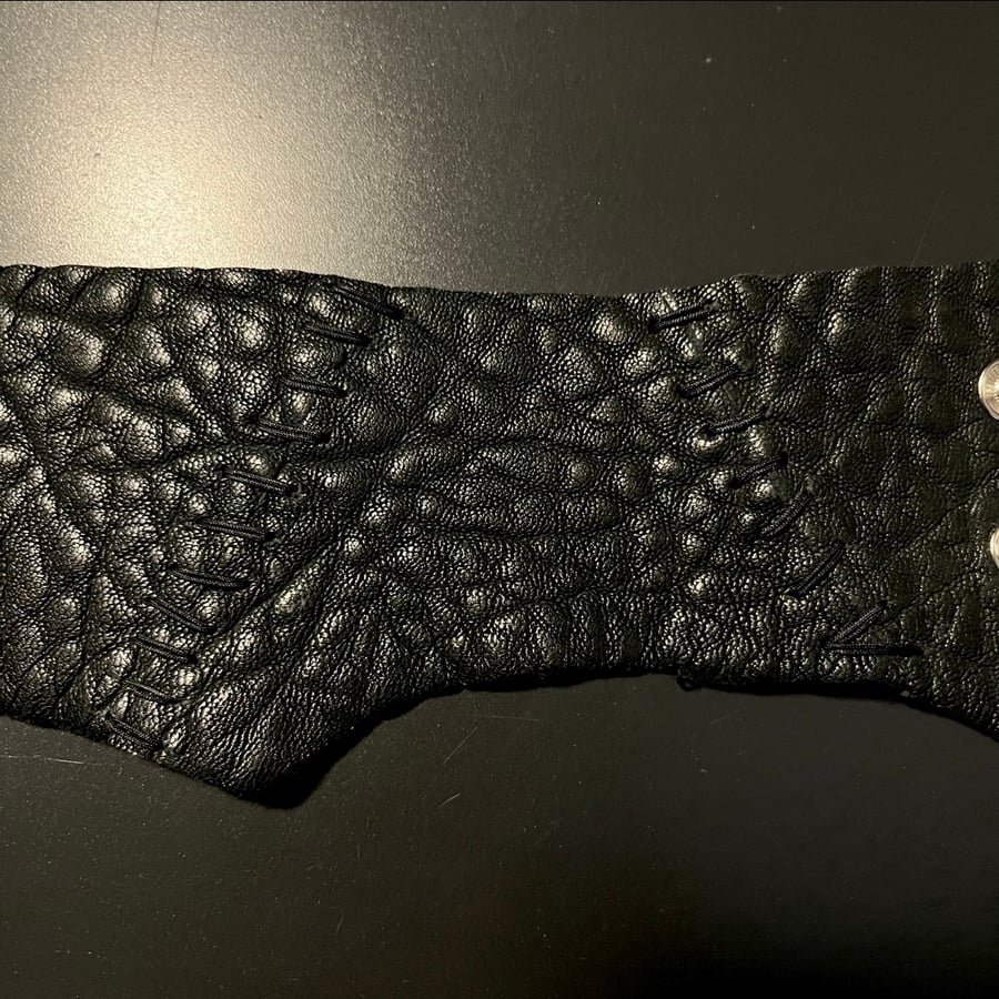 stitched cowhide cuff