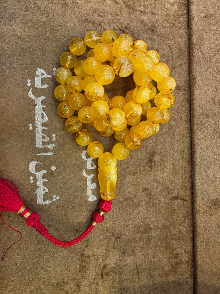 سبحة كهرمان شوائب 66غ
