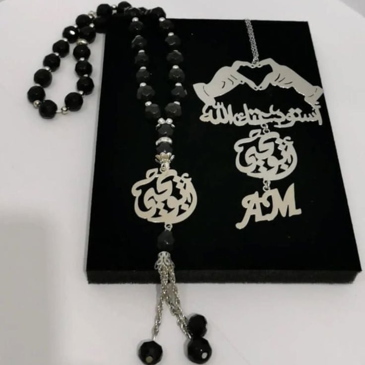 تعليقه سياره مع سبحة بالاسم