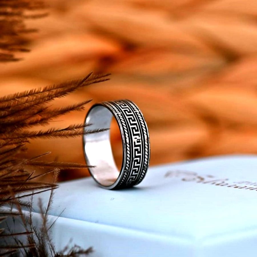 Versace model ring