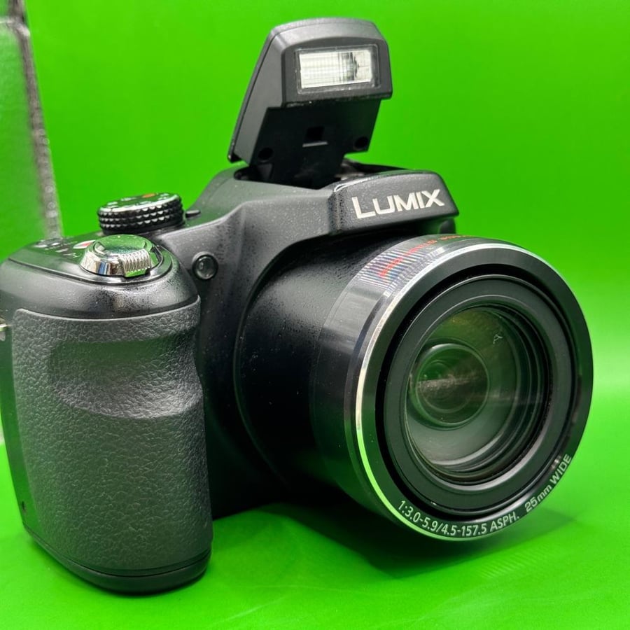 Lumix 35X camera used zoom 35X resolution: 16 megapixels • optical zoom: 30x very strong (long-distance zoom) • lens: 4.5-135mm • aperture: F3.0 – F5.9 • video: HD 720p • screen: 3 inch • flash: available (as shown in the picture) • camera type: Bridge (b