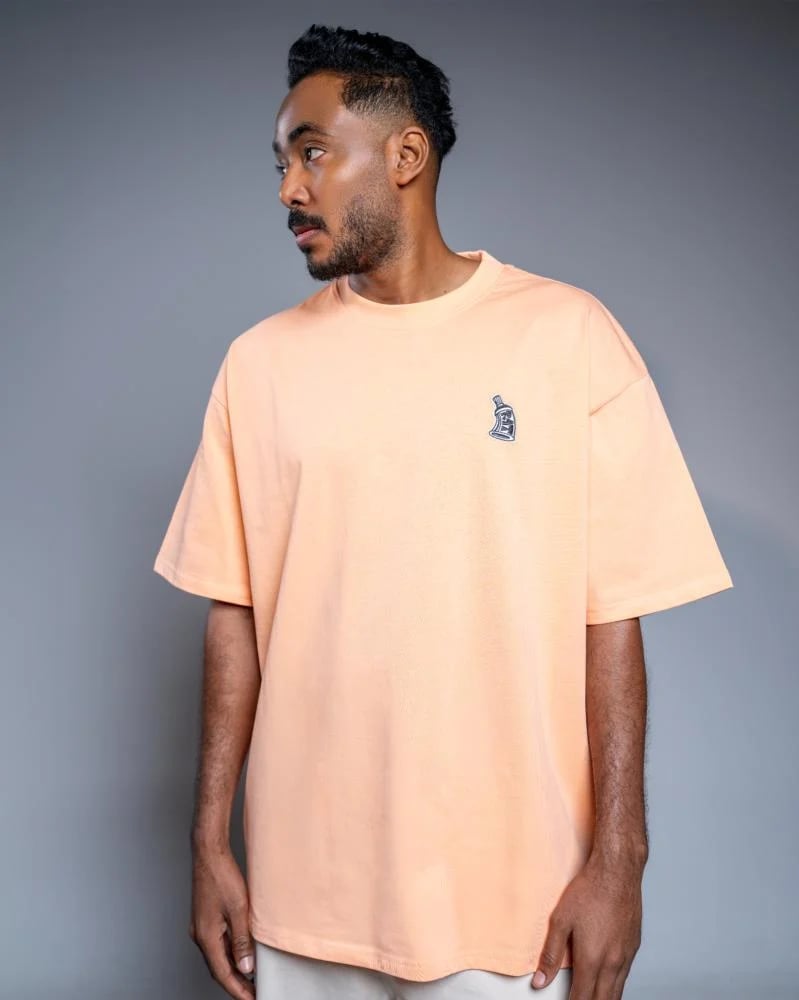 Orange T-shirt with a design