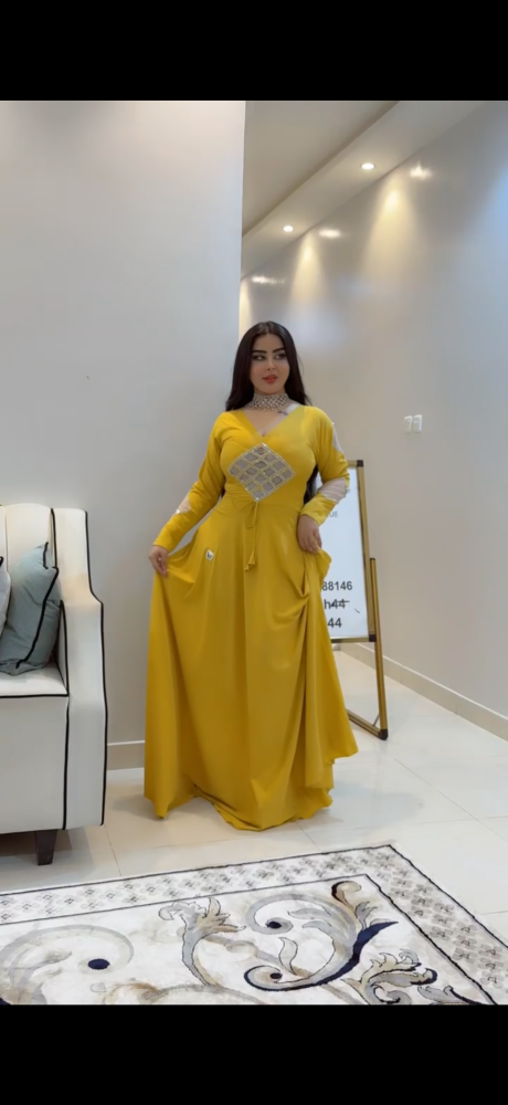 فستان كلوش كموني فاتح قماش بودره كامل مزين بكرستال فضي