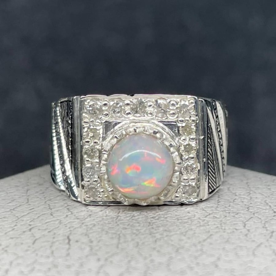 Men's silver ring with natural Ethiopian opal stone, adorned with natural diamonds