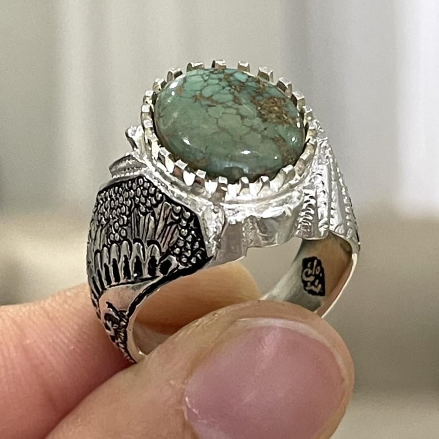 Men's silver ring with natural Nishapur turquoise stone